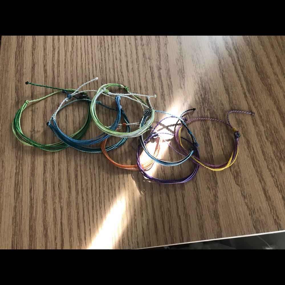 Gently worn bundle of 8 Pura Vida Bracelets